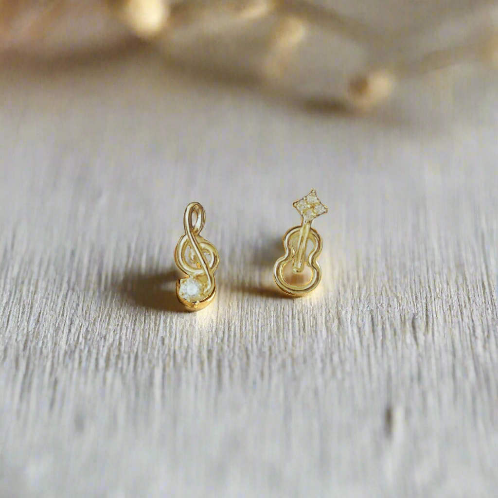 Affordable sterling silver music note and guitar zircon stud earrings for women, available in Canada. Creative jewelry design featuring sparkling zircon stones, perfect gift for music lovers and fans of elegant, affordable accessories.