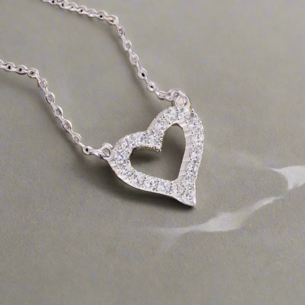 ZirconHeartPendant-Affordable heart-shaped zircon pendant necklace with sparkling stones and a fine clavicle chain. Elegant and stylish jewelry for any occasion, available in Canada. Perfect affordable gift for women, symbolizing love and affection.