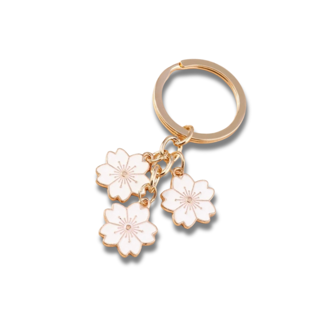cherry blosson charm-affordable jewelry in Canada-This vibrant and stylish keychain features colorful enameled cherry blossom flower charms, each delicately crafted with a smooth, glossy finish. The design is further enhanced by a chic tassel, adding a pl